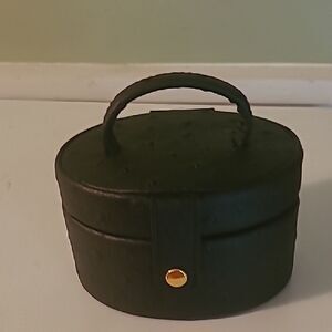 Black Oval Jewlry Case with Gold Accent